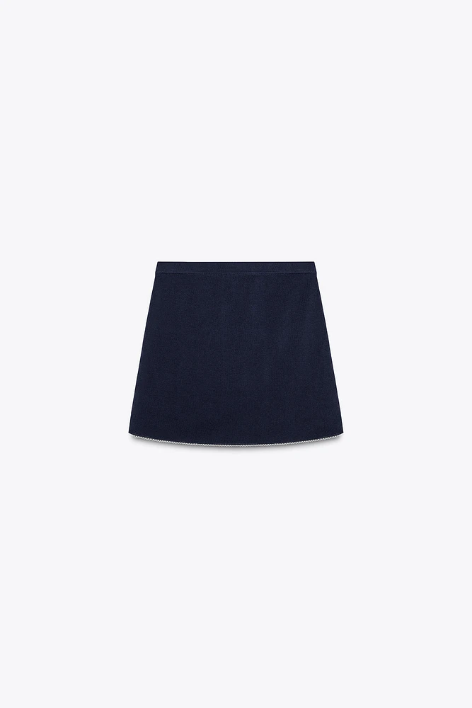 MINI KNIT SKIRT WITH PIPING