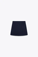 MINI KNIT SKIRT WITH PIPING