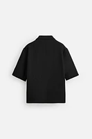 RELAXED FIT TEXTURED POLO SHIRT