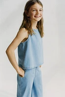 SLEEVELESS ZIP TOP
