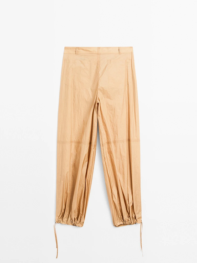 Lightweight trousers with strap details - Studio
