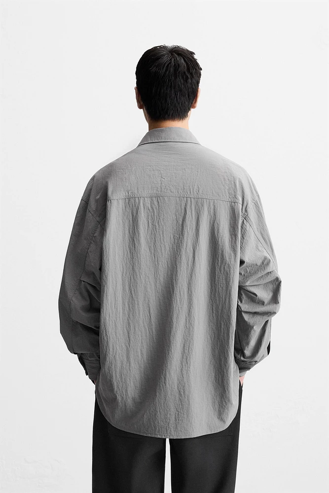 CHEMISE FLUIDE À POCHES UTILITAIRES
