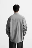 CHEMISE FLUIDE À POCHES UTILITAIRES