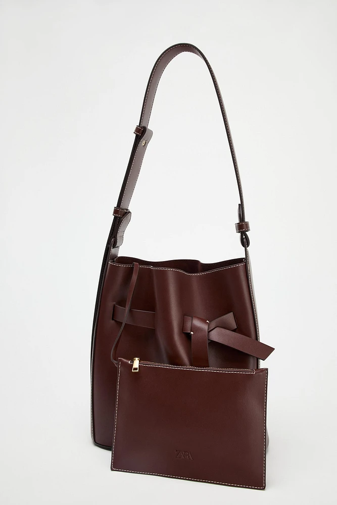 KNOTTED TOPSTITCHED BUCKET BAG
