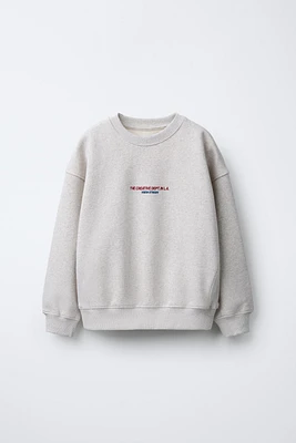 HEATHERED TEXT SWEATSHIRT