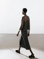 Strappy top with contrast topstitching