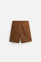 RELAXED FIT PLEATED SHORTS