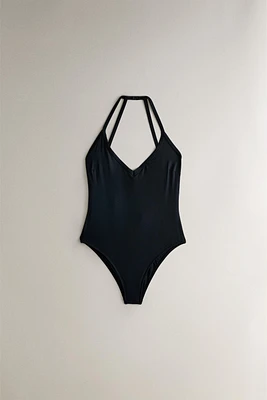 PLAIN BEACH SWIMSUIT WITH STRAPS AT THE BACK