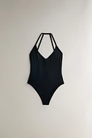 PLAIN BEACH SWIMSUIT WITH STRAPS AT THE BACK