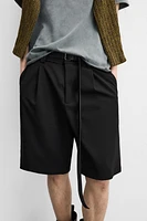 TEXTURED PLEATED SHORTS