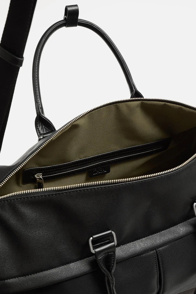 TEXTURED TRAVEL BAG