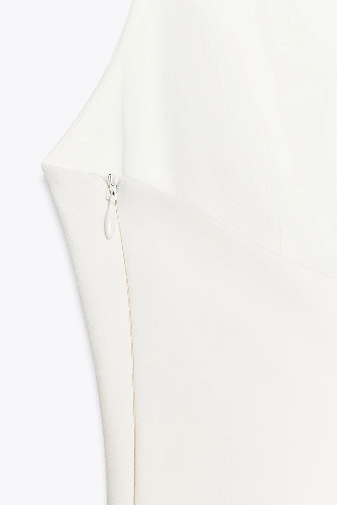 STRETCH PEPLUM TOP