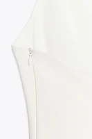 STRETCH PEPLUM TOP