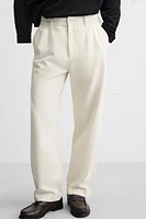 RELAXED FIT PLEATED PANTS