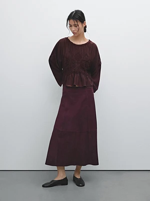 Flowing blouse with gathered detail