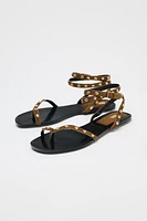 SANDALES À BRIDES ET CLOUS EN CUIR
