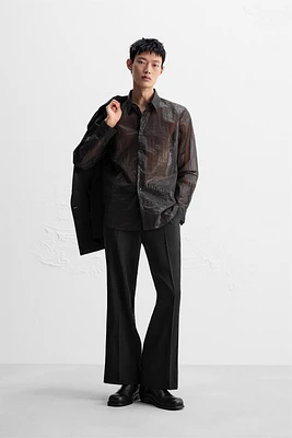 CHEMISE SEMI-TRANSPARENTE LIMITED EDITION