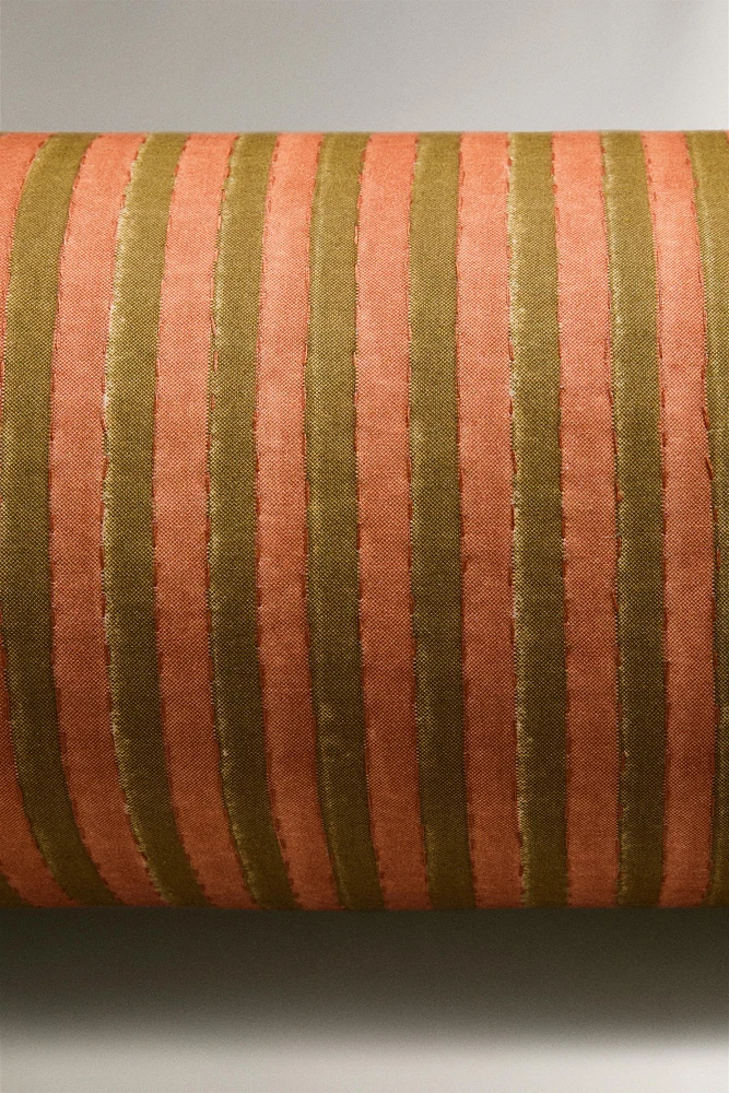 STRIPED CYLINDRICAL CUSHION