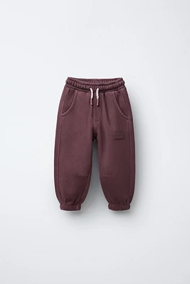 PANTALON DE JOGGING À ÉTIQUETTE