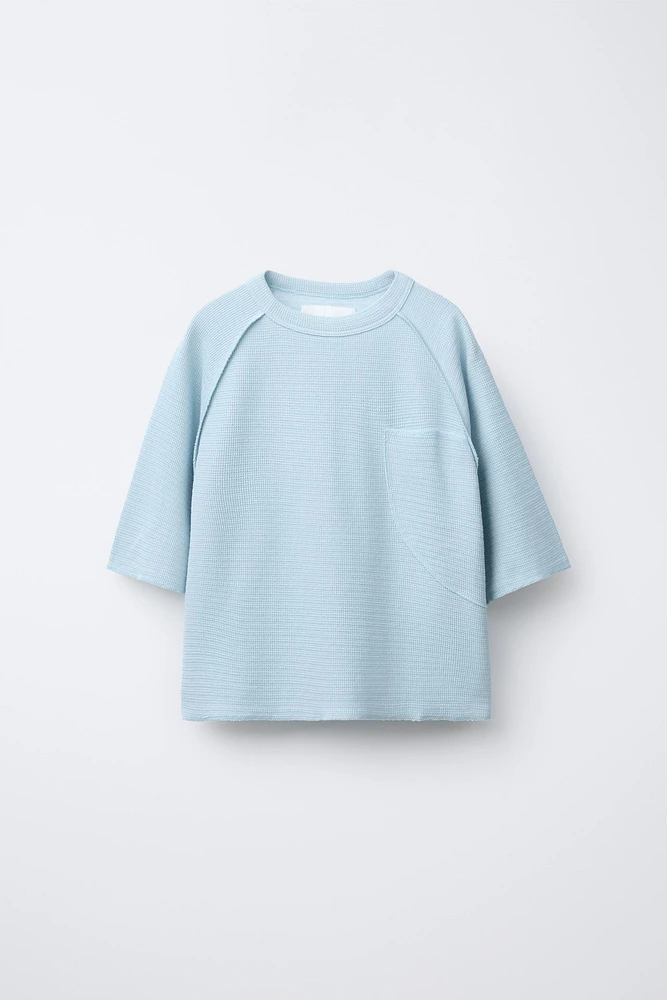 T-SHIRT STRUCTURÉ À POCHE