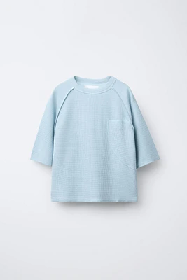 T-SHIRT STRUCTURÉ À POCHE