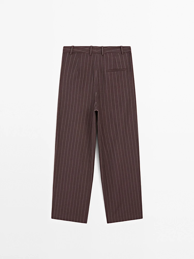 Pantalon à pinces et rayures tennis