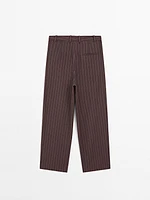 Pantalon à pinces et rayures tennis