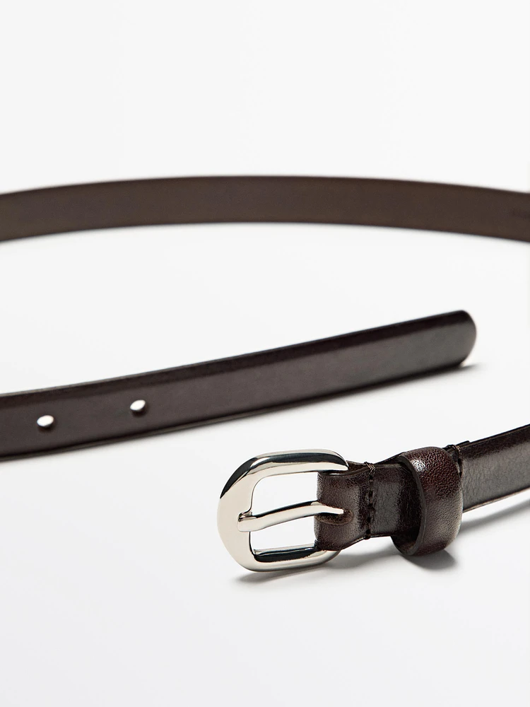 Leather belt with arched buckle