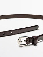 Leather belt with arched buckle