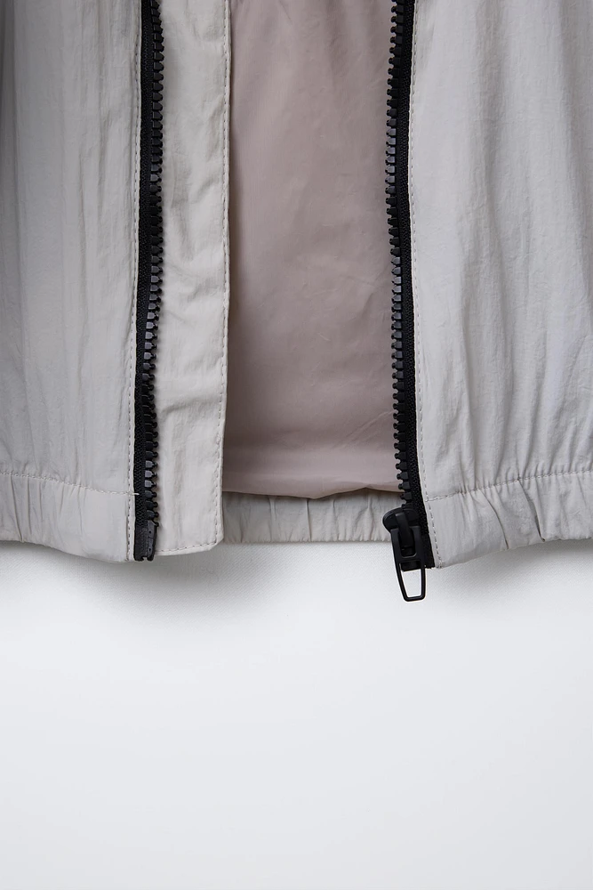 TECHNICAL RAINCOAT