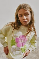 SWEAT FLEUR EN RELIEF