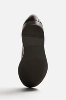 CHAUSSURES EN CUIR À BOUCLE