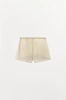 PLEATED LACE LIMITED EDITION SHORTS
