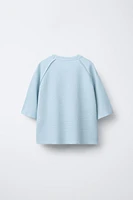 T-SHIRT STRUCTURÉ À POCHE