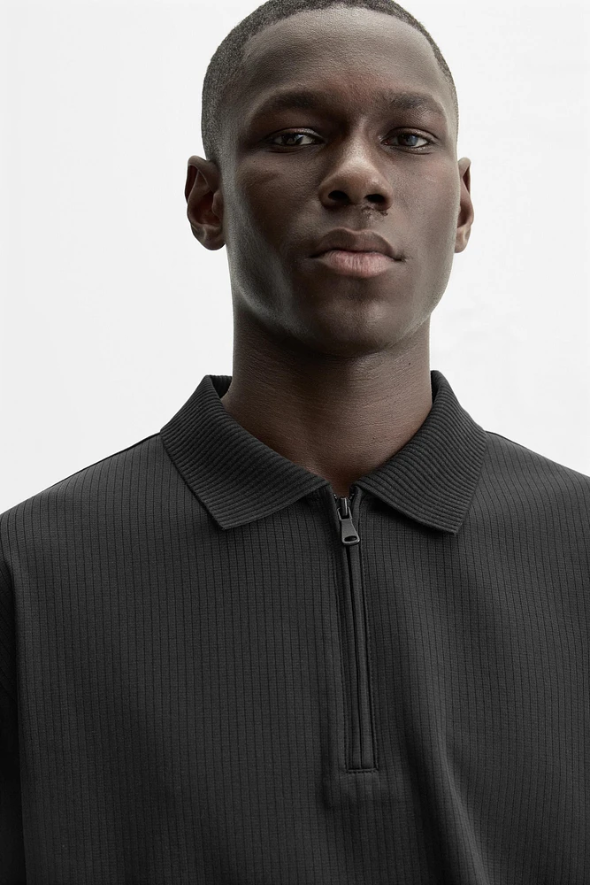 TEXTURED ZIP POLO SHIRT