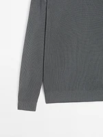 Pull en maille à col montant
