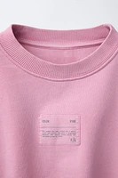 LABEL DETAIL BALLOON-HEM CROPPED SWEATSHIRT