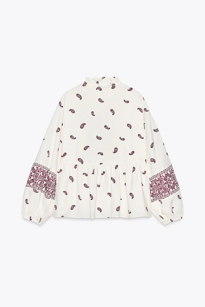 BLOUSE IMPRIMÉE À POMPONS