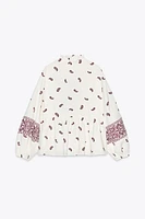 BLOUSE IMPRIMÉE À POMPONS