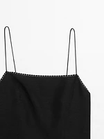 Strappy top with contrast topstitching
