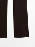Pantalon slim flare taille basse