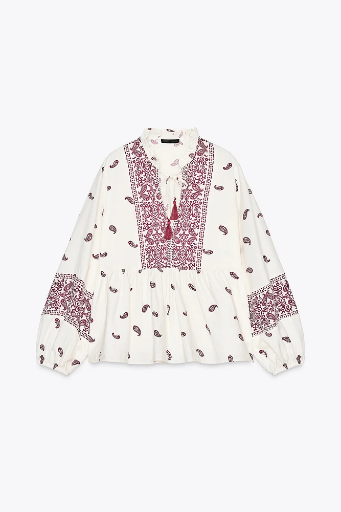 BLOUSE IMPRIMÉE À POMPONS