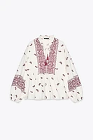BLOUSE IMPRIMÉE À POMPONS