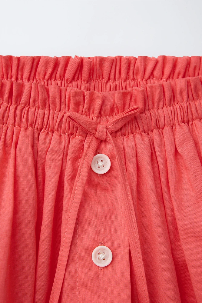 BUTTON SKORT