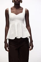 STRETCH JACQUARD PEPLUM TOP