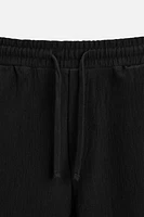TEXTURED JOGGER SHORTS