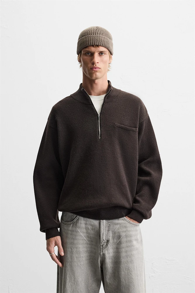 QUARTER ZIP SWEATER