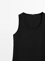 Long sleeveless satin blouse