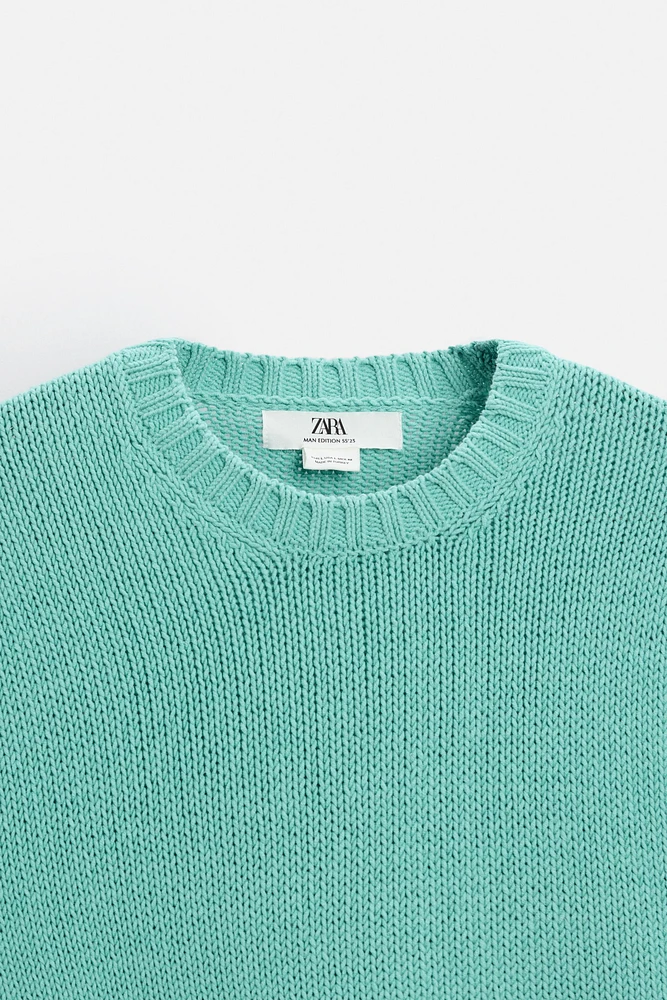 Relaxed fit cotton blend sweater. Round neck and long sleeves. Rib trim.