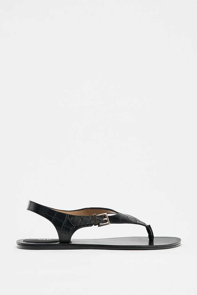 EMBOSSED FLAT SANDALS